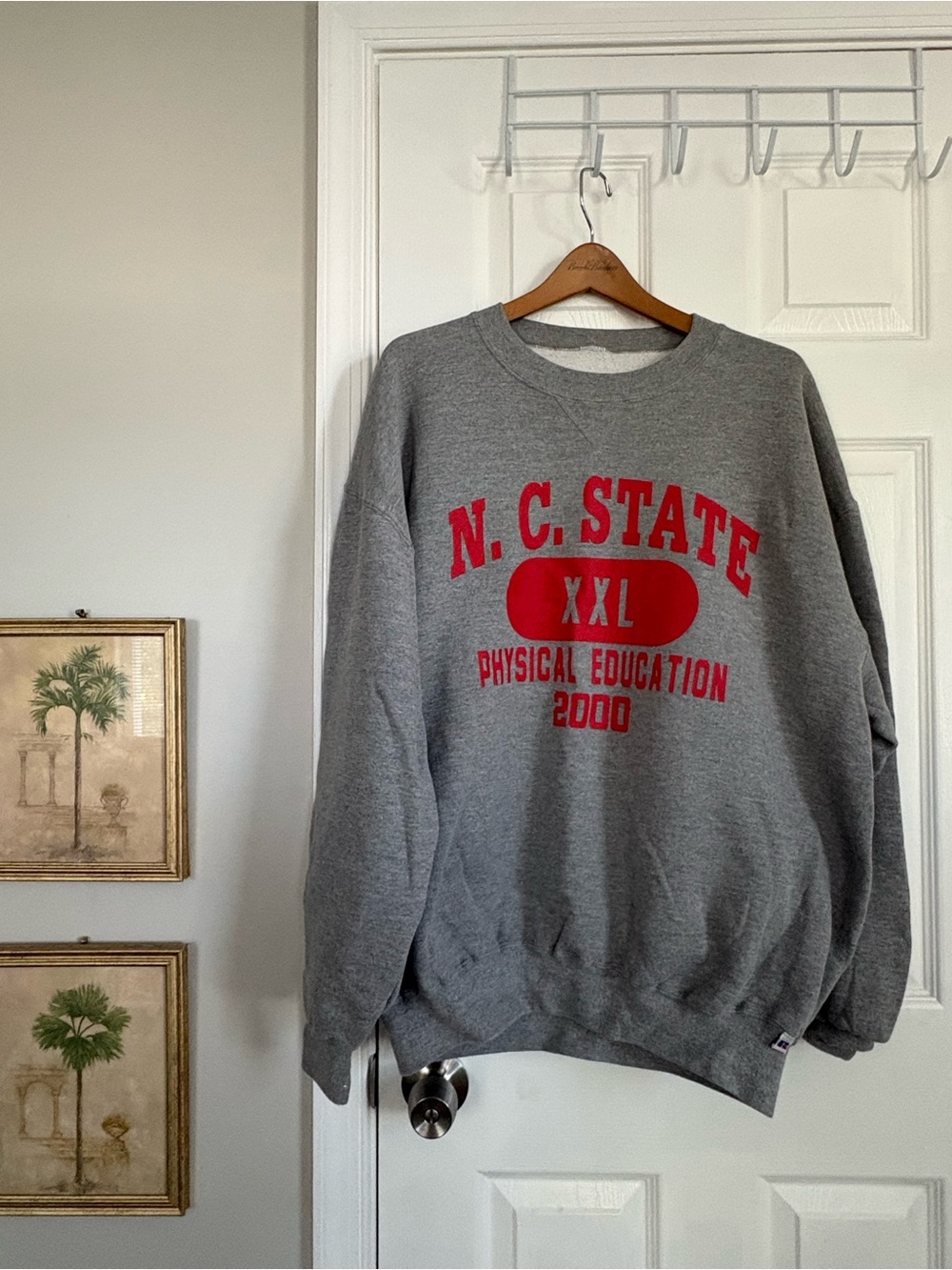 N. C. State Gray Crewneck Sweatshirt with Red Logo